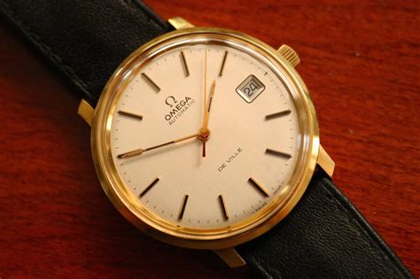 omega watch solid gold|omega gold watches for men.